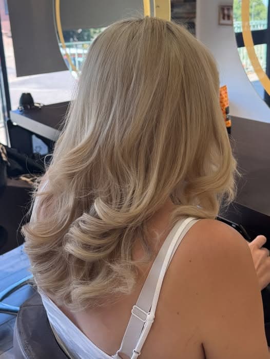 Blonde wavy styling A Cut Above Chatham
